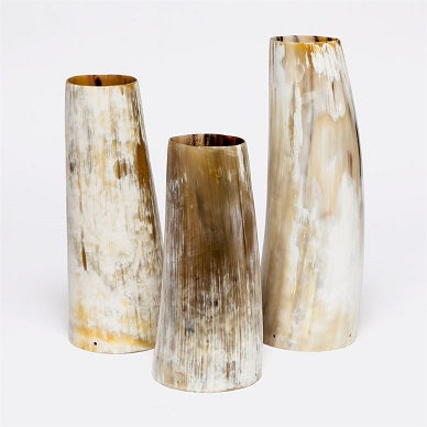 three horn vases in different heights