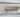 closeup of hair-on-hide texture and brushed metal drawer handle