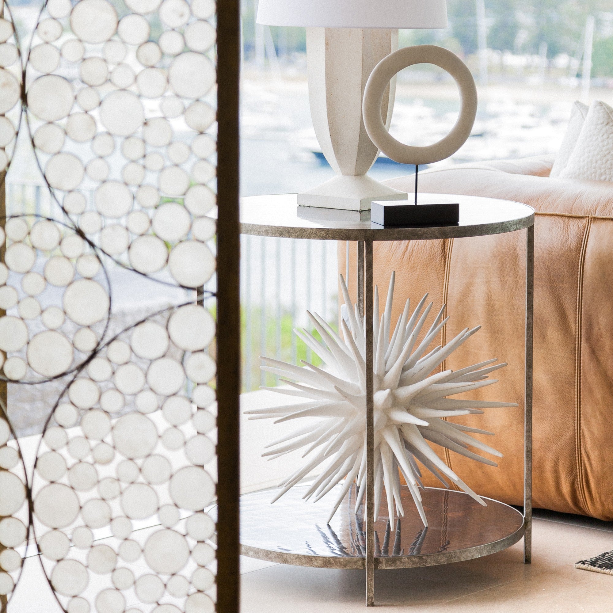large sea urchin sculpture used as decor on side table