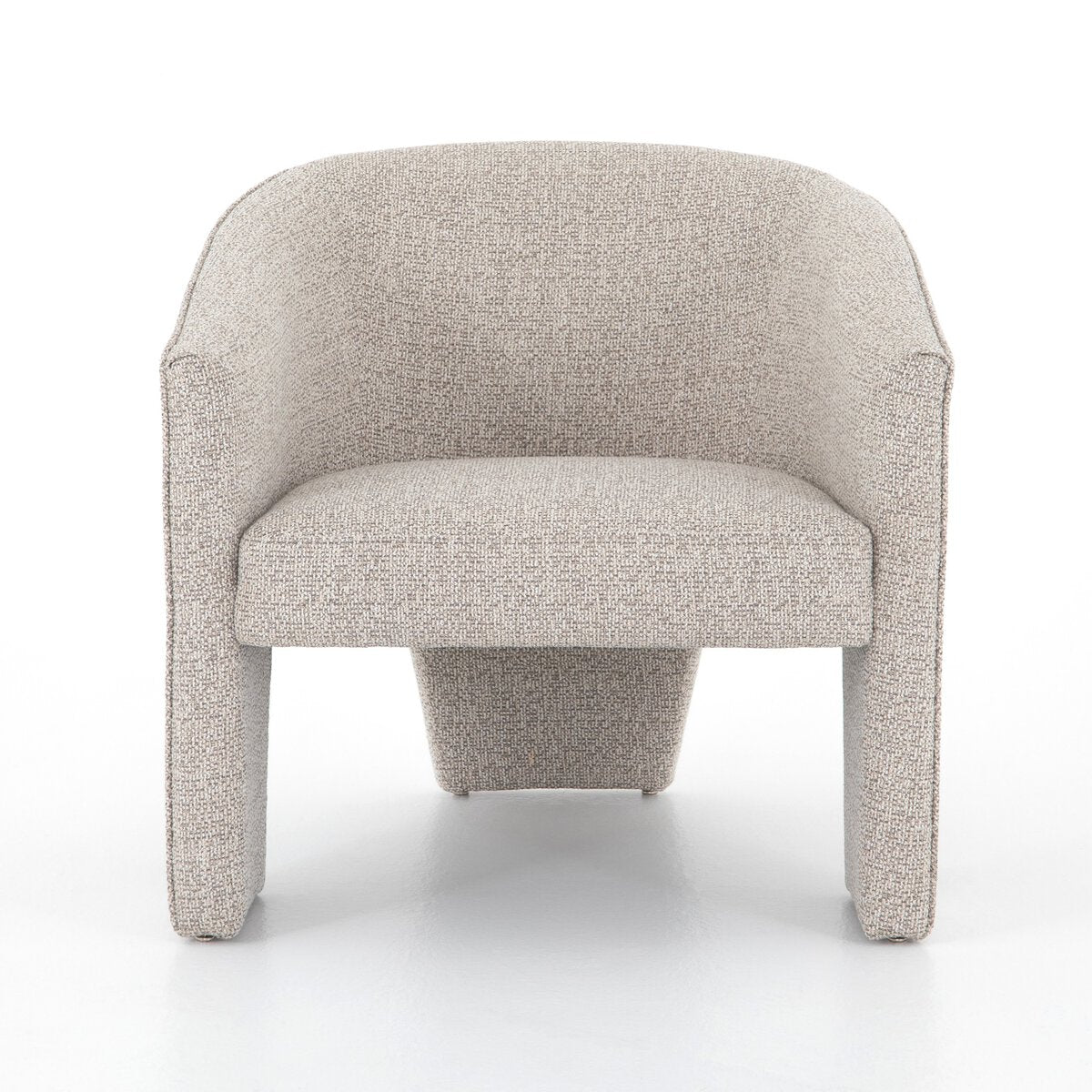 Four Hands Fae dining chair upholstered in premium Italian top-grain leather featuring a sculptural three-legged design and curved modern silhouette