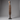 Antique Tuareg carved wood tent peg with geometric engraving, mounted on a display stand