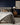 Channeled Upholstered Bed with Plinth Base in 46.5" headboard, Flannel – styled in a bedroom