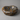 Polished jasper stone doughnut bowl with blue, grey, brown, and gold speckled veining