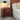 luxury burl wood nightstand styled in modern bedroom interior