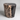 Polished petrified wood stool in onyx-black with ivory crack veining

