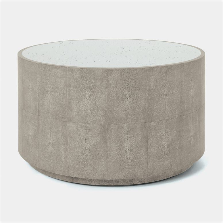 round mirror-top table in color option sand