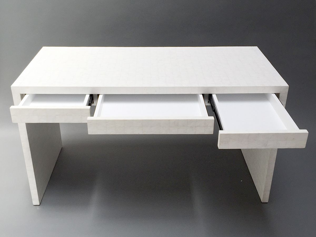 white shell desk with all three drawers opened