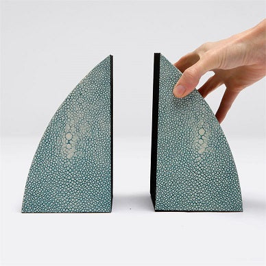 two curved bookends in color option turquoise