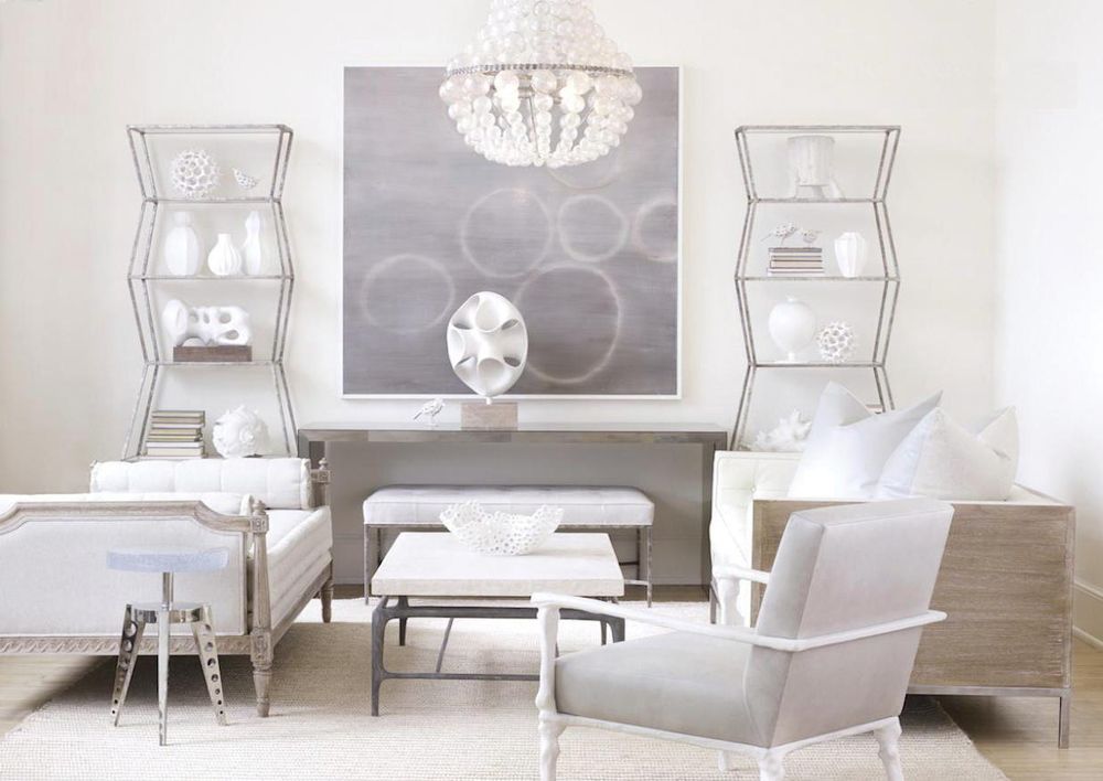 two sets of silver shelving featured in sitting room