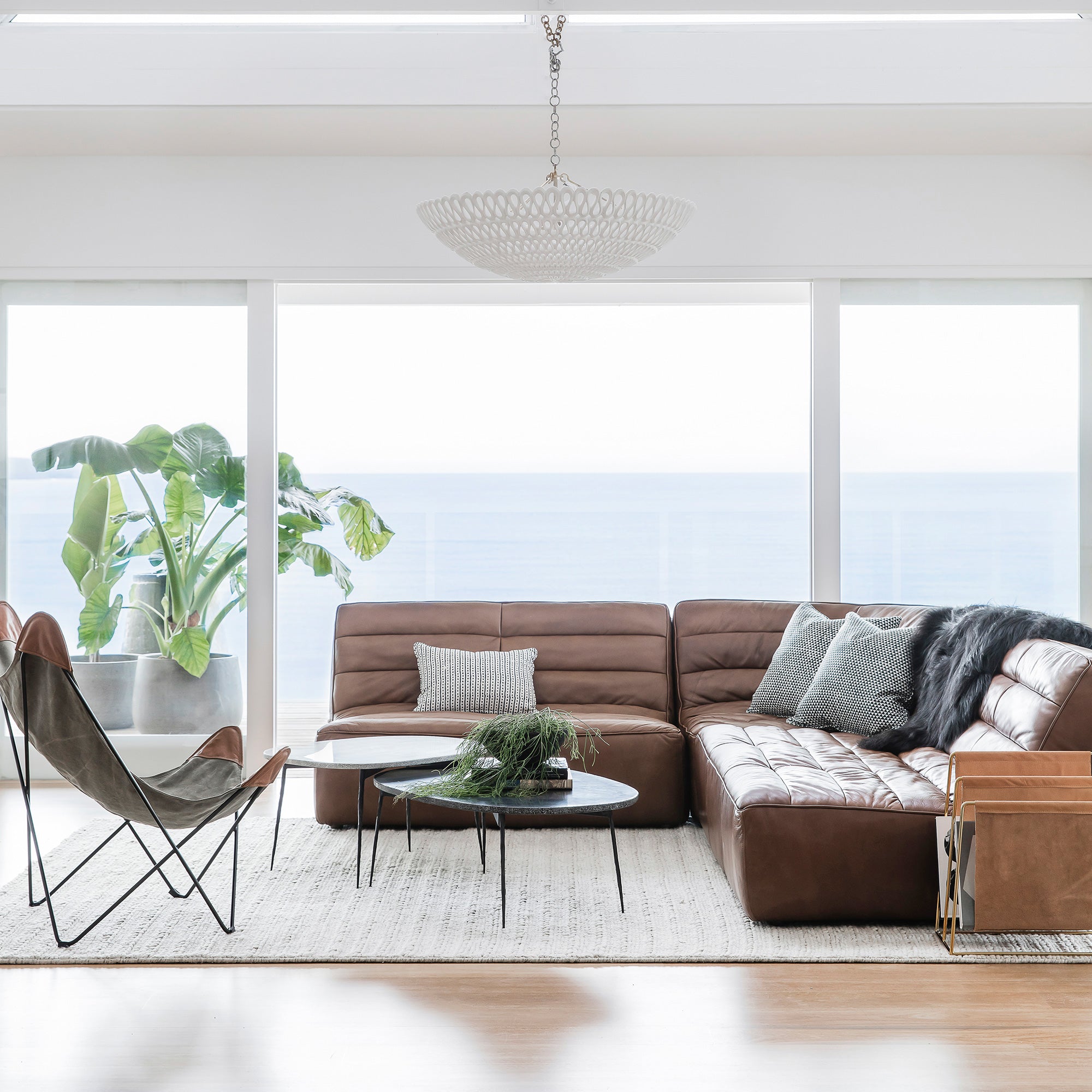 chandelier showcased in beachfront living space