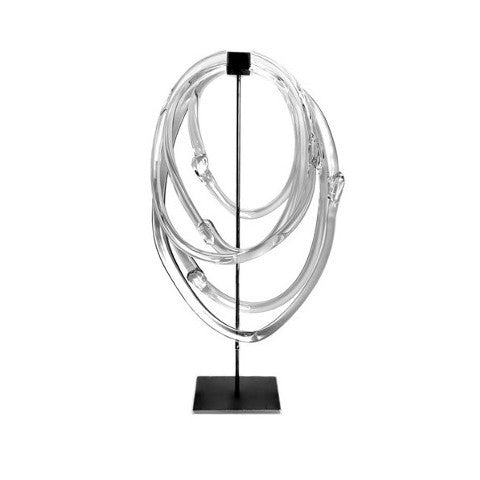 glass lasso-shaped decor on black metal stand