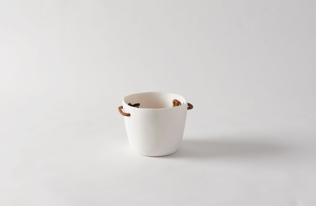 small white resin bucket shown empty
