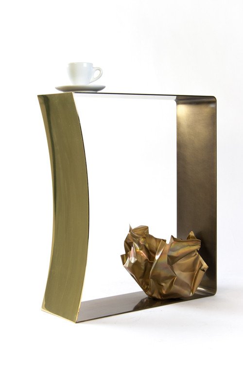 darkened brass stool shown rotated for alternative display